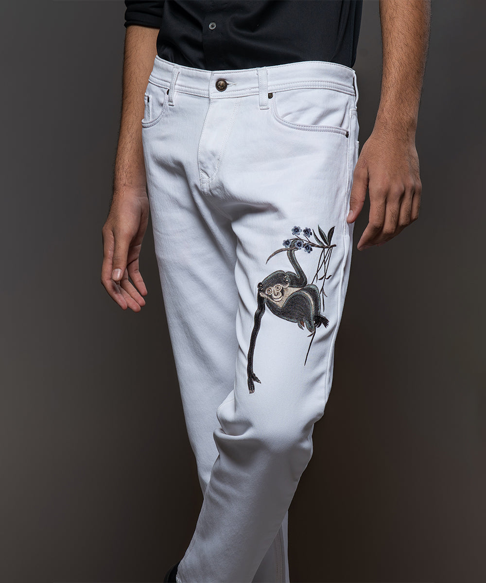 Off White Jeans With Monkey Embroidery