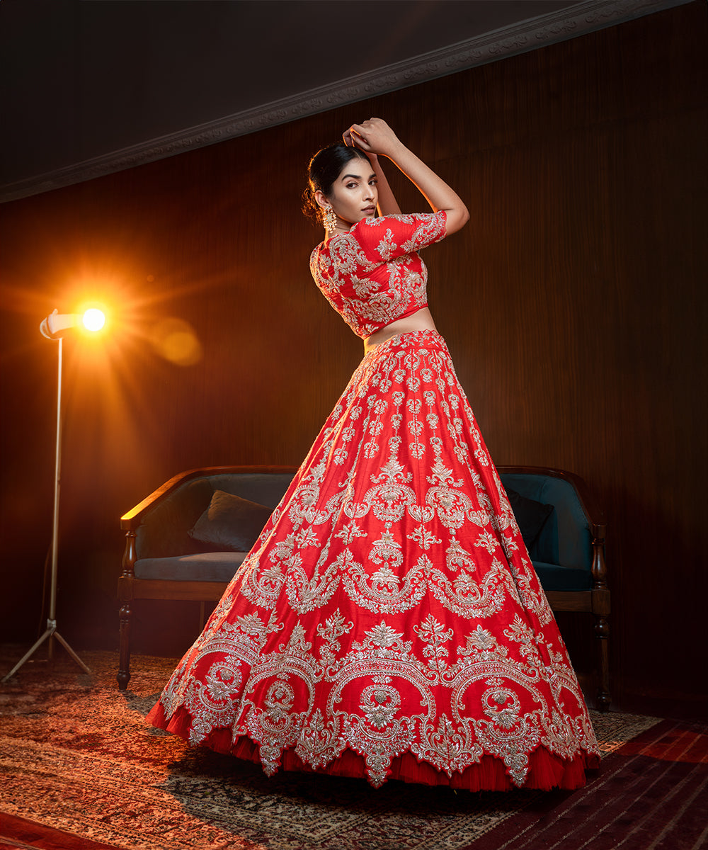Red Heavy Lehengas With Semi Circle Motifs