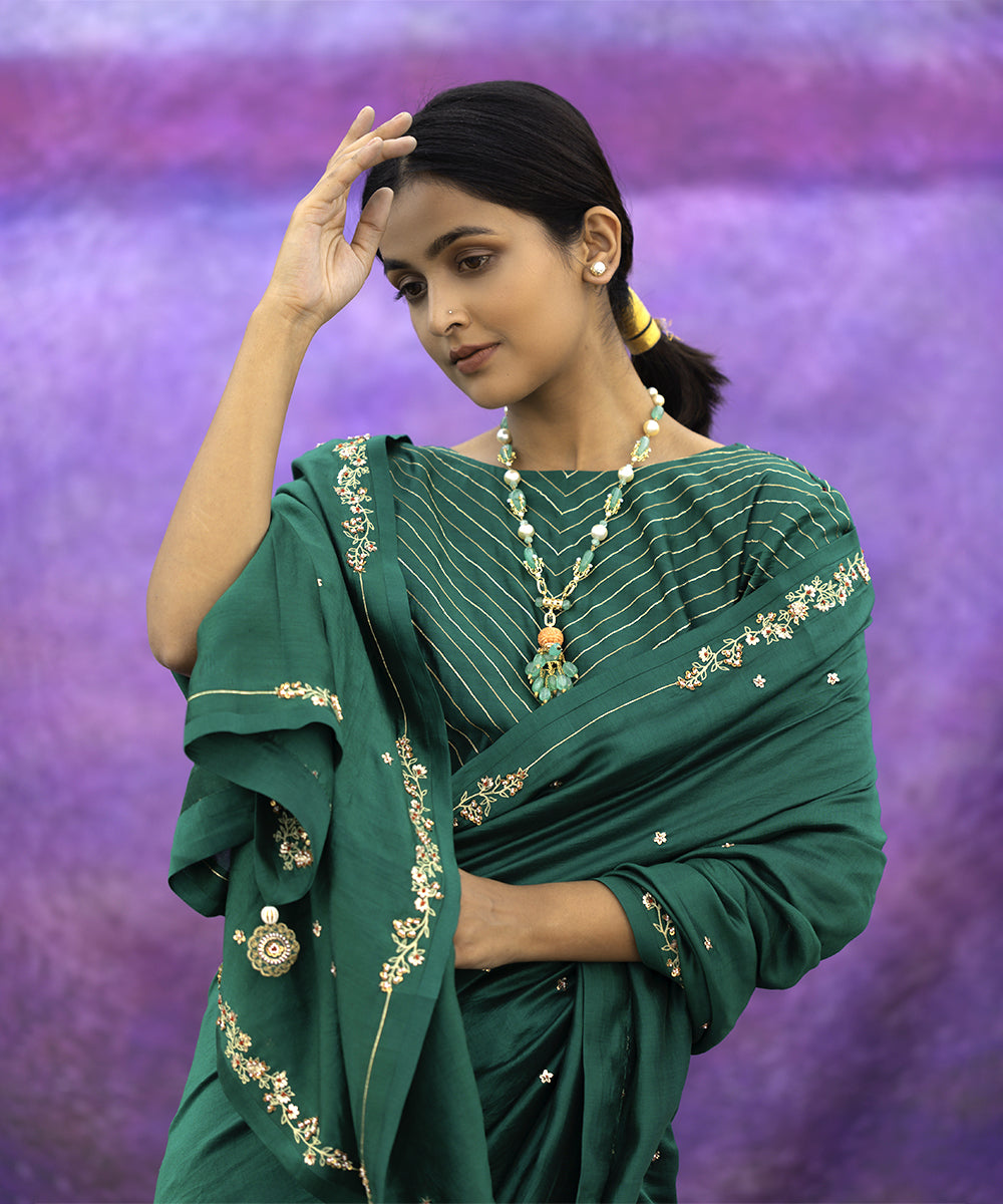 Green signature style border hand embroidered saree with blouse