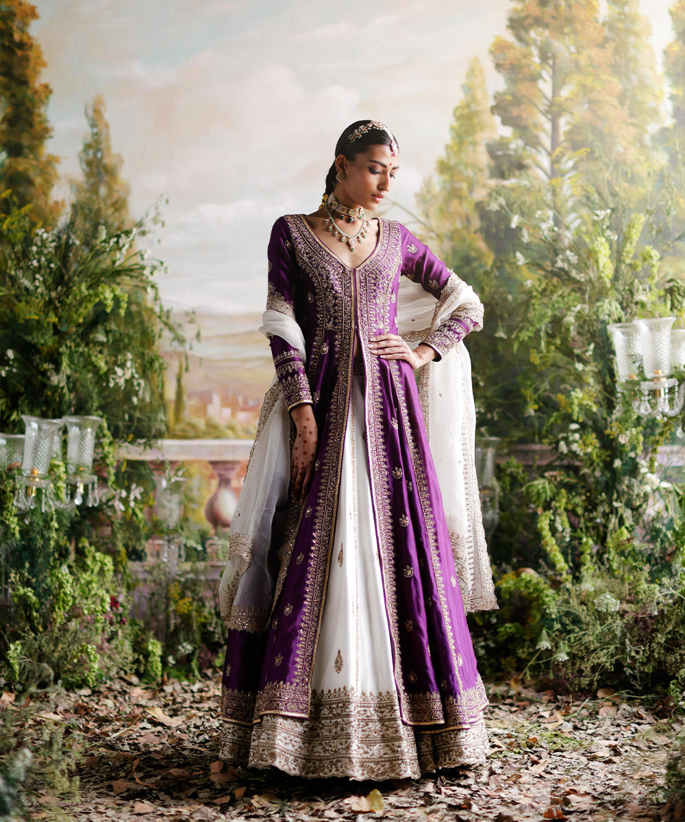 Purple jacket with ivory lehenga