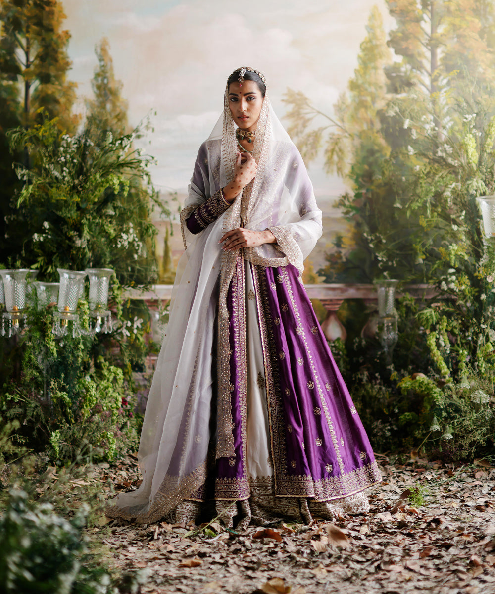 Purple jacket with ivory lehenga