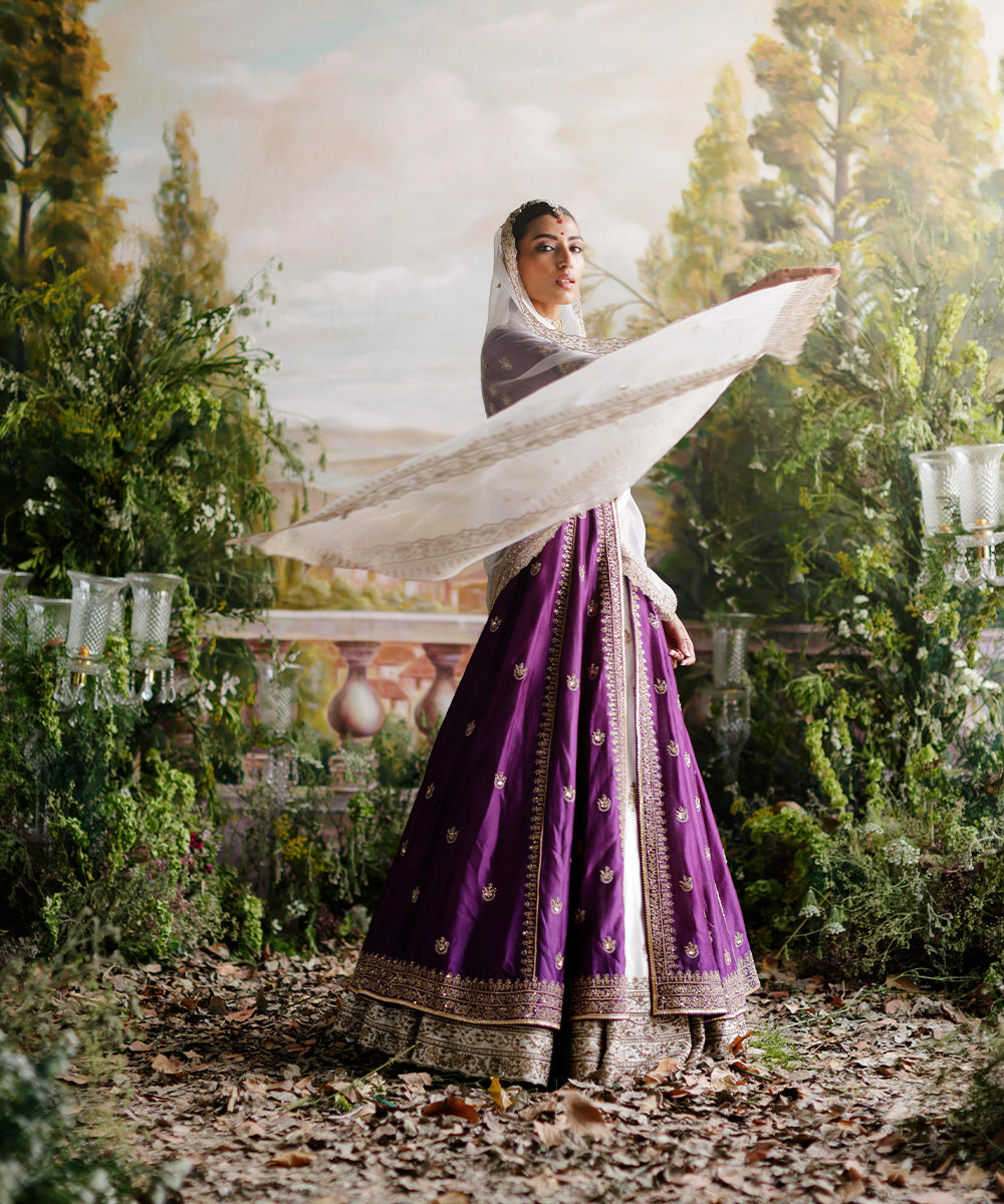 Purple jacket with ivory lehenga