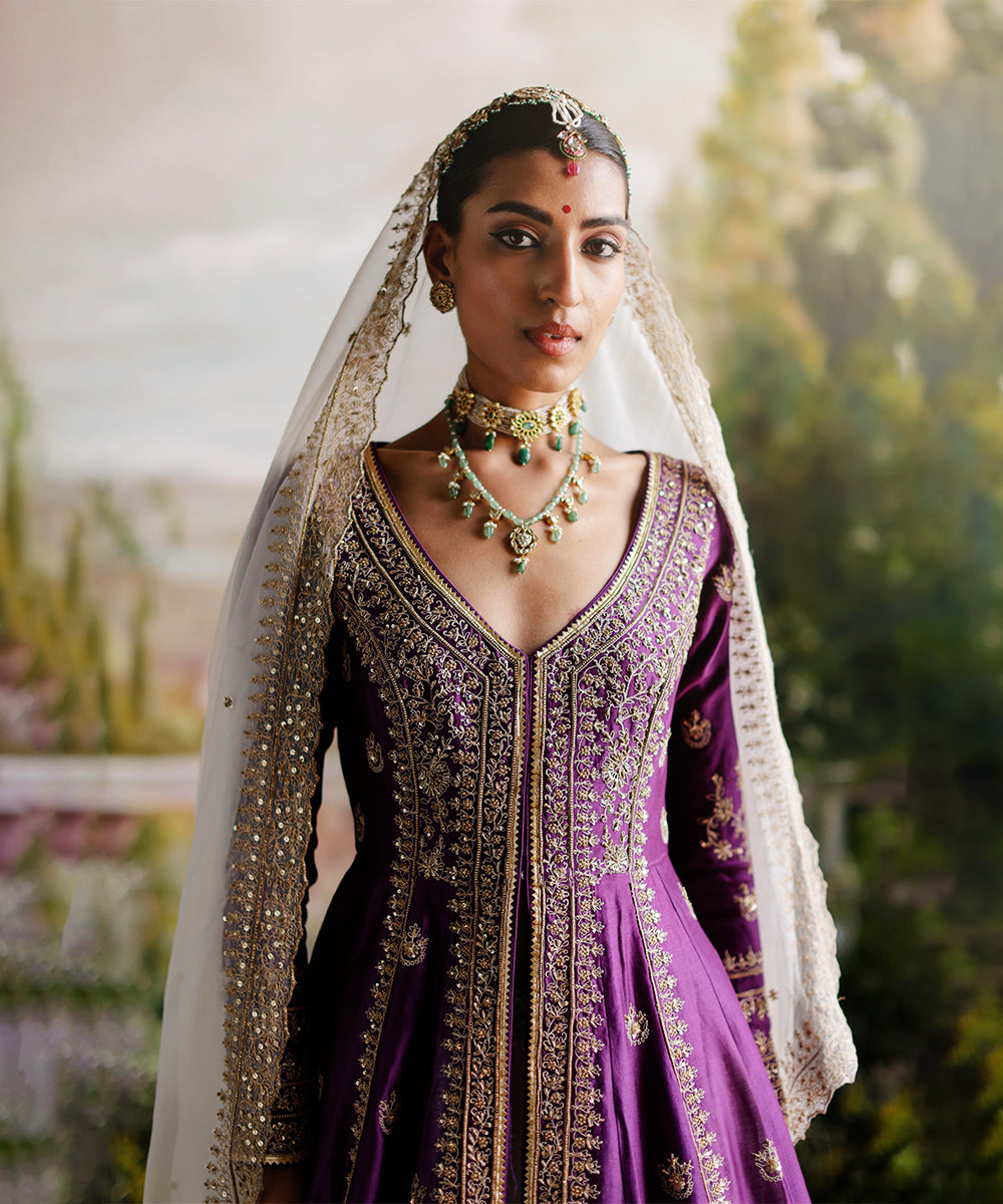 Purple jacket with ivory lehenga