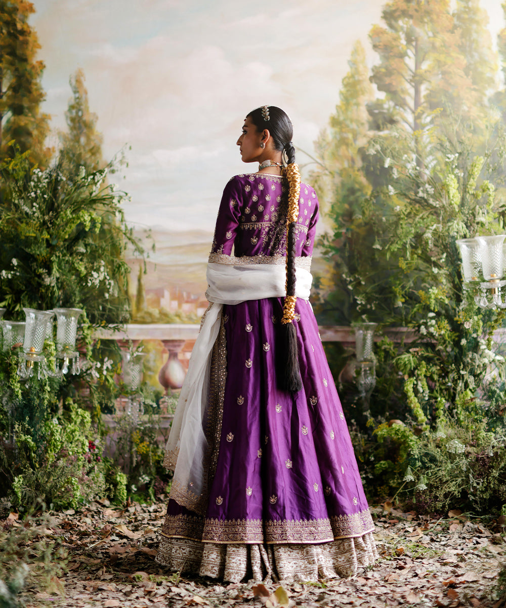 Purple jacket with ivory lehenga