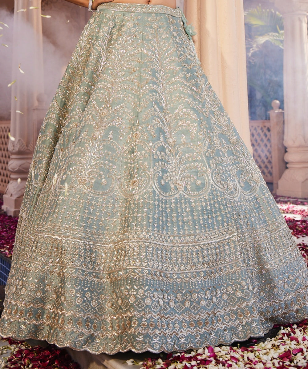 Margrette: Dusty Firoza Heavily Hand Embroidered Lehenga